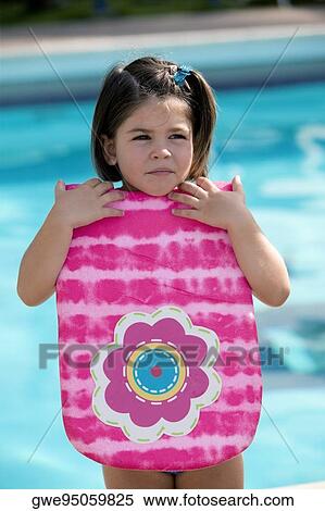 Close-up of a girl holding a boogie board View Large Photo Image Stock Photography - Close-up of a girl holding a boogie board. Fotosearch