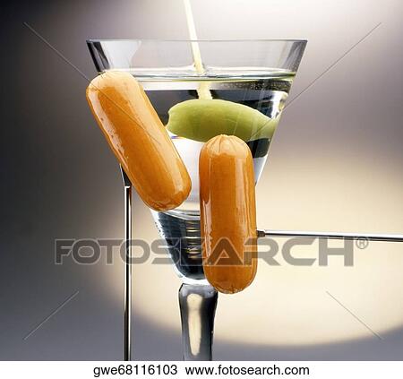 Close-up of a glass of martini View Large Photo Image Stock Image - Close-up of a glass of martini. Fotosearch
