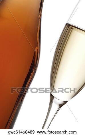 Close-up of a glass of wine with a wine bottle View Large Photo Image Stock Photo - Close-up of a glass of wine with a wine bottle. Fotosearch