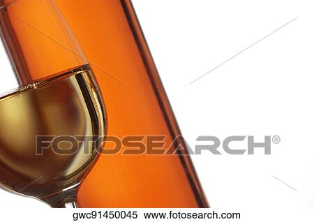 Close-up of a glass of wine with a wine bottle View Large Photo Image Stock Photography - Close-up of a glass of wine with a wine bottle. Fotosearch