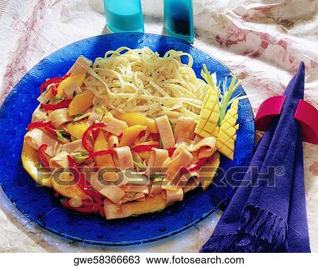 Stock Image - Close-up of a ham and pasta. Fotosearch