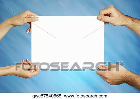 Close-up of a man and a woman's hand holding a placard View Large Photo Image Stock Photography - Close-up of a man and a woman's hand holding a placard. Fotosearch