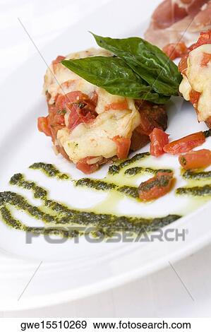 Stock Photo - Close-up of a meat dish in a plate. Fotosearch