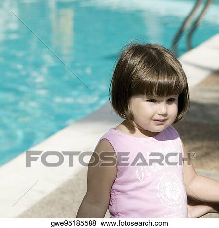 Stock Photo - Close-up of a mother with her daughter smiling. Fotosearch