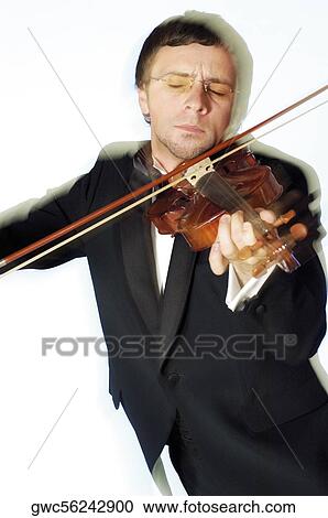 Stock Image - Close-up of a musician playing the violin. Fotosearch