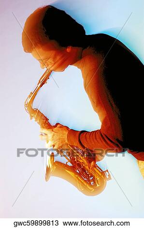 Close-up of a musician playing the saxophone View Large Photo Image Stock Image - Close-up of a musician playing the saxophone. Fotosearch