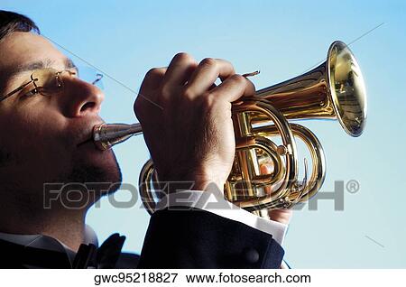 Close-up of a musician playing the trumpet View Large Photo Image Stock Photo - Close-up of a musician playing the trumpet. Fotosearch