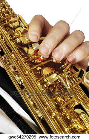 Stock Photography - Close-up of a musician's hand playing the saxophone. Fotosearch
