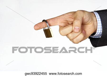 Stock Photography - Close-up of a padlock on a person's finger. Fotosearch