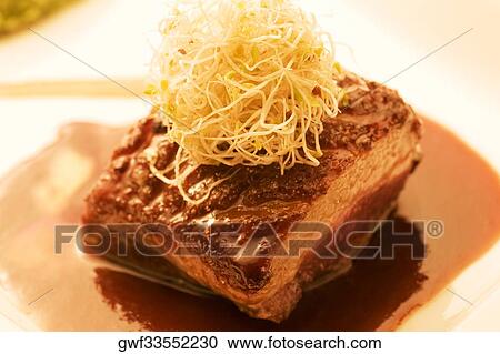 Close-up of a piece of grilled meat served on a tray View Large Photo Image Stock Image - Close-up of a piece of grilled meat served on a tray. Fotosearch