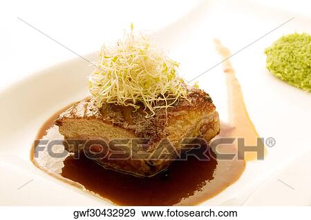 Close-up of a piece of grilled meat served on a platter View Large Photo Image Stock Photo - Close-up of a piece of grilled meat served on a platter. Fotosearch