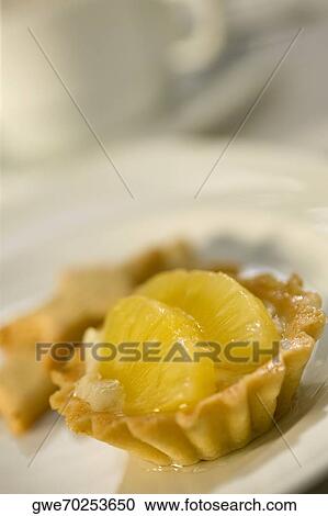 Close-up of a pineapple tart View Large Photo Image Stock Image - Close-up of a pineapple tart. Fotosearch
