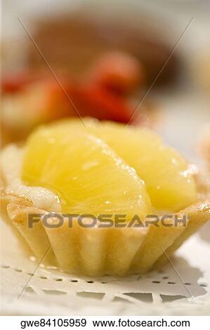 Close-up of a pineapple tart View Large Photo Image Stock Photo - Close-up of a pineapple tart. Fotosearch