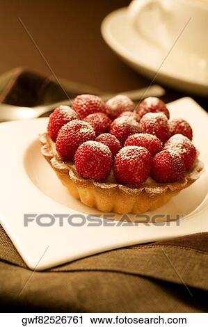 Close-up of a raspberry tart View Large Photo Image Stock Image - Close-up of a raspberry tart. Fotosearch