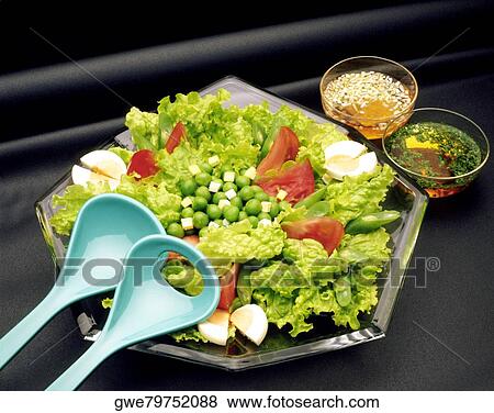 Close-up of a salad in a tray View Large Photo Image Stock Photo - Close-up of a salad in a tray. Fotosearch