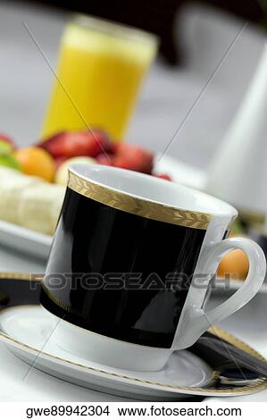 Close-up of a tea cup in a saucer View Large Photo Image Picture - Close-up of a tea cup in a saucer. Fotosearch
