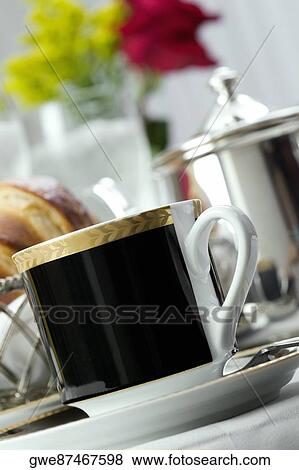 Stock Photo - Close-up of a tea cup in a saucer. Fotosearch