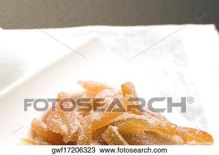 Close-up of a tray of a baked sugar coated dessert View Large Photo Image Stock Image - Close-up of a tray of a baked sugar coated dessert. Fotosearch