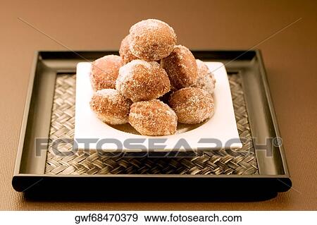 Close-up of a tray of a baked sugar coated dessert View Large Photo Image Stock Photo - Close-up of a tray of a baked sugar coated dessert. Fotosearch