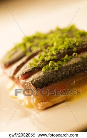 Stock Photography - Close-up of a tray of filleted fish. Fotosearch