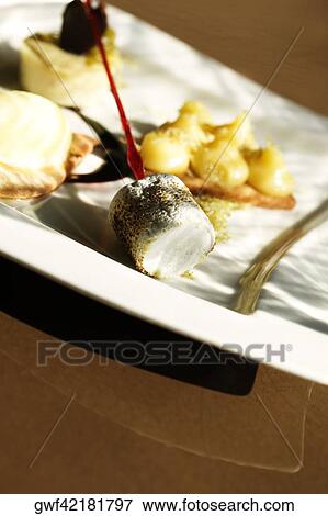 Close-up of a tray of gourmet dessert View Large Photo Image Stock Photo - Close-up of a tray of gourmet dessert. Fotosearch