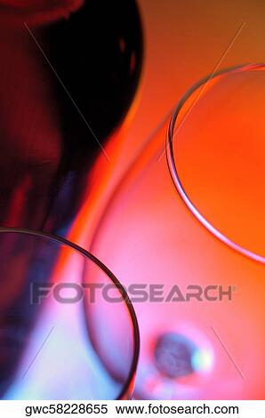 Close-up of a wine bottle with two wineglasses View Large Photo Image Stock Photography - Close-up of a wine bottle with two wineglasses. Fotosearch