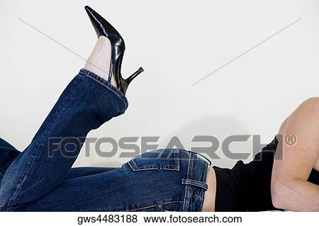 Close-up of a woman wearing stilettos View Large Photo Image Stock Photo - Close-up of a woman wearing stilettos. Fotosearch