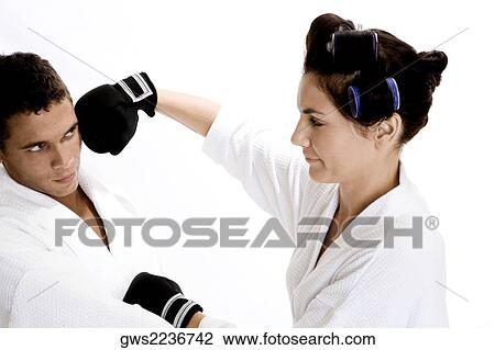 Close-up of a young couple sparring View Large Photo Image Stock Image - Close-up of a young couple sparring. Fotosearch