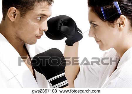 Close-up of a young couple sparring View Large Photo Image Stock Photo - Close-up of a young couple sparring. Fotosearch