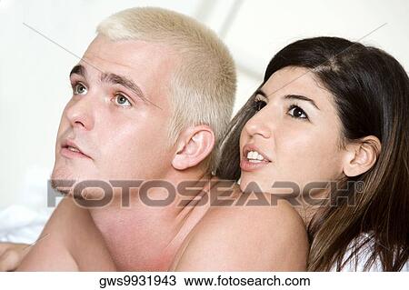 Close-up of a young couple View Large Photo Image Stock Image - Close-up of a young couple. Fotosearch
