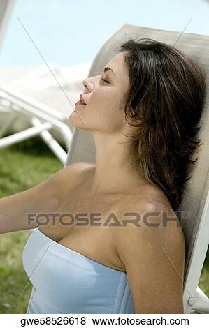 Close-up of a young woman sleeping View Large Photo Image Stock Photo - Close-up of a young woman sleeping. Fotosearch