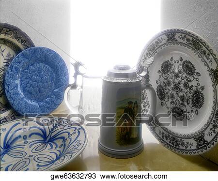 Close-up of ceramic plates and jug View Large Photo Image Stock Image - Close-up of ceramic plates and jug. Fotosearch