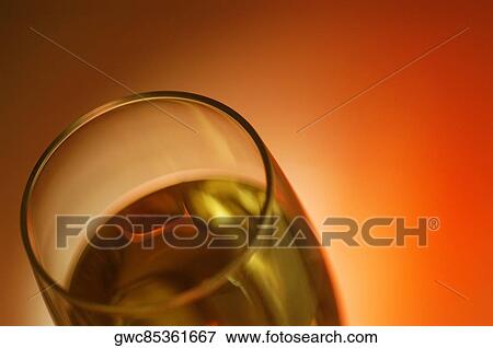 Close-up of champagne in a champagne flute View Large Photo Image Stock Photo - Close-up of champagne in a champagne flute. Fotosearch