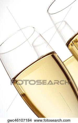Close-up of champagne in three champagne flutes View Large Photo Image Picture - Close-up of champagne in three champagne flutes. Fotosearch