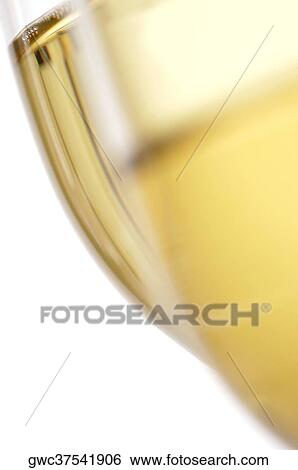 Close-up of champagne in two champagne flutes View Large Photo Image Stock Photograph - Close-up of champagne in two champagne flutes. Fotosearch