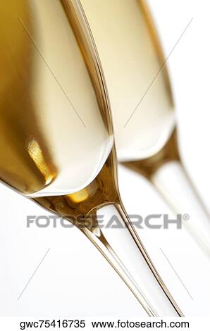 Stock Photography - Close-up of champagne in two champagne flutes. Fotosearch