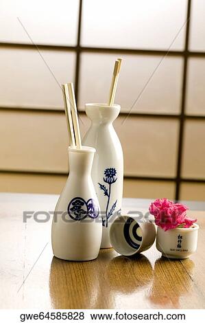 Stock Photo - Close-up of chopsticks in vase. Fotosearch