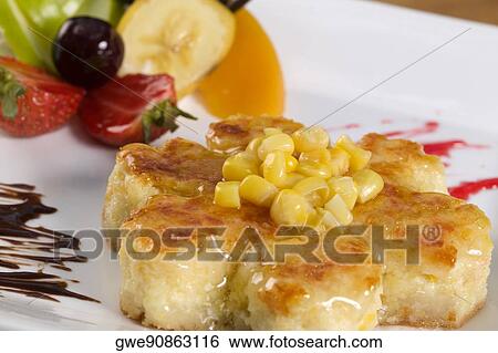 Close-up of corn cakes in a plate View Large Photo Image Stock Photograph - Close-up of corn cakes in a plate. Fotosearch