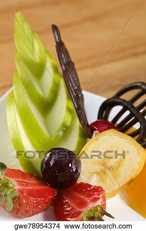 Close-up of fruit salad in a plate View Large Photo Image Picture - Close-up of fruit salad in a plate. Fotosearch