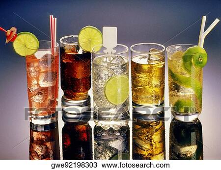 Close-up of glasses of cocktail drinks View Large Photo Image Stock Image - Close-up of glasses of cocktail drinks. Fotosearch