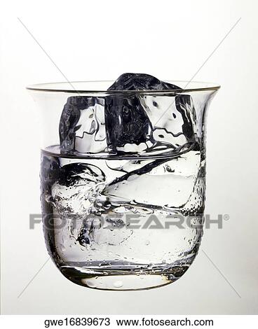 Close-up of ice cubes in a glass of water View Large Photo Image Stock Image - Close-up of ice cubes in a glass of water. Fotosearch