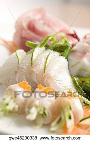 Close-up of prepared fishes topped with caviar in a plate View Large Photo Image Stock Photo - Close-up of prepared fishes topped with caviar in a plate. Fotosearch