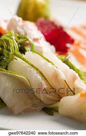 Close-up of seafood salad in a plate View Large Photo Image Stock Image - Close-up of seafood salad in a plate. Fotosearch