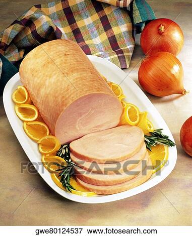 Close-up of sliced ham with onions View Large Photo Image Stock Photo - Close-up of sliced ham with onions. Fotosearch