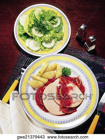 Close-up of sliced ham with salad View Large Photo Image Stock Image - Close-up of sliced ham with salad. Fotosearch