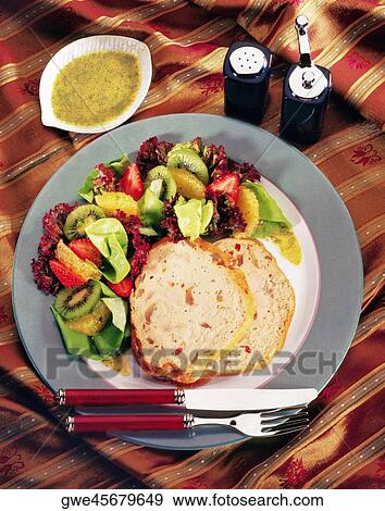 Close-up of sliced ham with salad View Large Photo Image Stock Photo - Close-up of sliced ham with salad. Fotosearch
