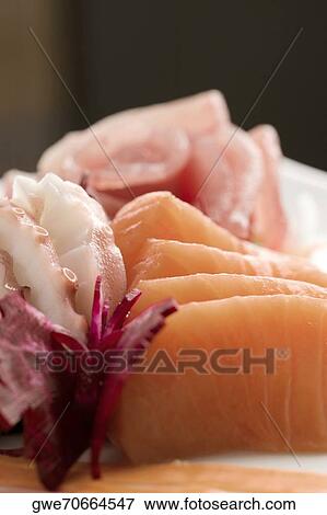 Close-up of slices of prepared fish View Large Photo Image Stock Photo - Close-up of slices of prepared fish. Fotosearch