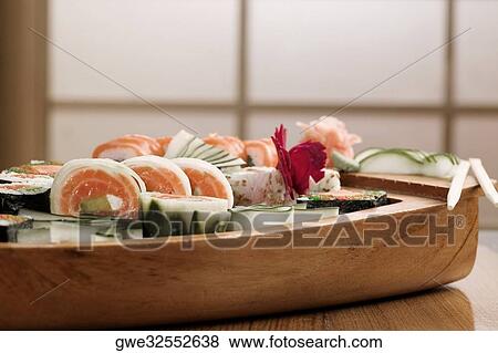 Close-up of sushi in a platter View Large Photo Image Stock Photo - Close-up of sushi in a platter. Fotosearch