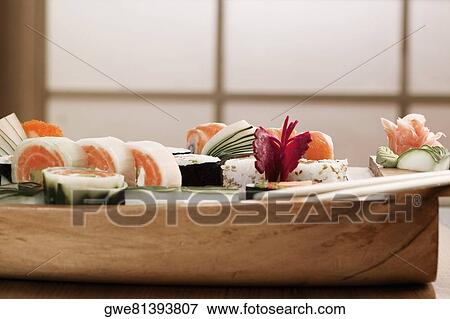 Close-up of sushi in a platter View Large Photo Image Stock Photo - Close-up of sushi in a platter. Fotosearch