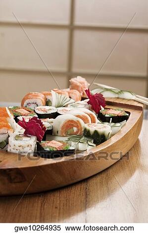 Close-up of sushi in a platter View Large Photo Image Stock Photography - Close-up of sushi in a platter. Fotosearch